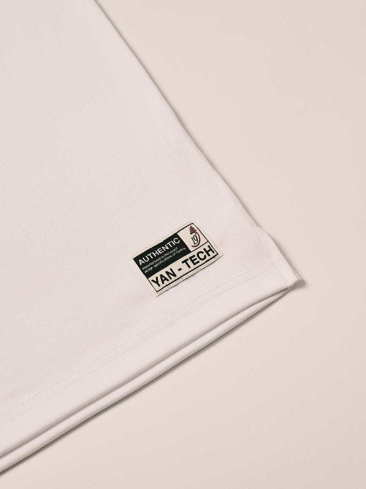 
                  
                    Yan-Tech polo -white
                  
                